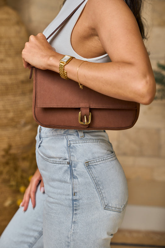 Manda suede brown handbag worn crossbody