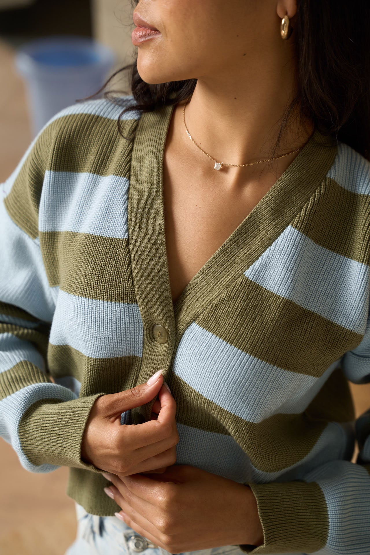 Rida cropped cardigan in baby blue and sage, front view showing buttoned V-neck and dropped shoulders